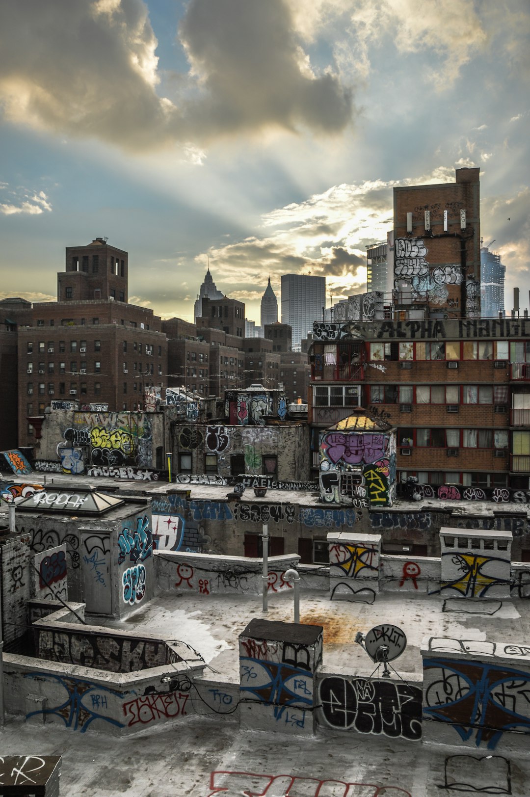 photo-of-gray-concrete-rooftop-beside-brown-building-evvasev1qie